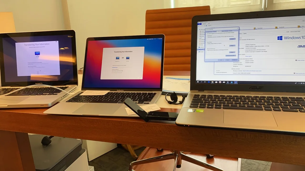 Microsoft 365 and Google Workspace on a laptop for a Malaysian business