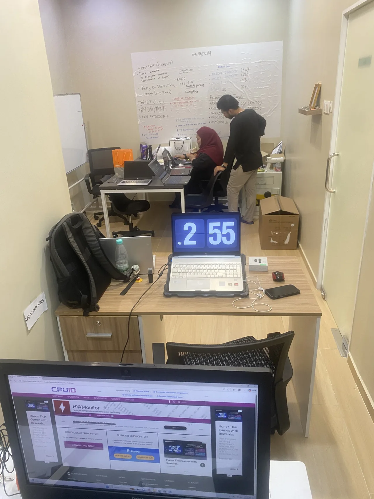 IT support engineer helping a Malaysian clinic with patient systems