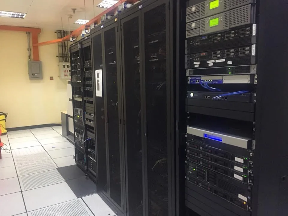 Cybergate IT engineer working in a server room in Malaysia